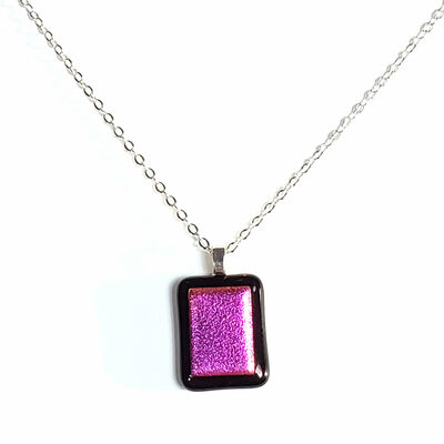 Dichroic fuchsia pink on black fused glass necklace