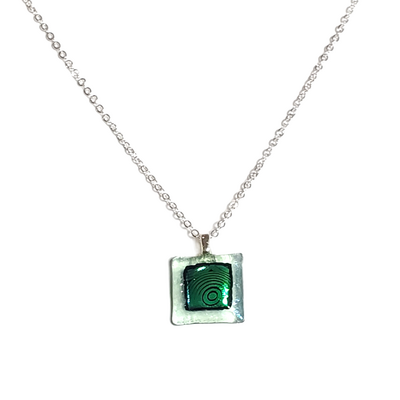 Dainty dichroic blue circles on transparent green fused glass pendant necklace