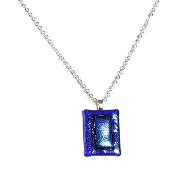Dichroic blue circles on iridescent blue fused glass pendant necklace