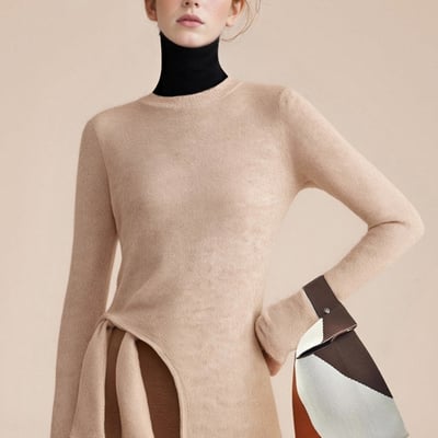 Fashionable, simple and casual long slit shoulder pad round neck long-sleeved knitted sweater